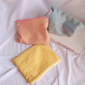 Three-piece set of large capacity gingham pencil cases in yellow, orange and blue