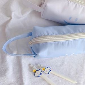 Detailed set of light blue and white smiley pencil cases with cloud decorative pens