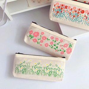 Floral canvas pencil case with zipper closure in minimalist aesthetic and large capacity