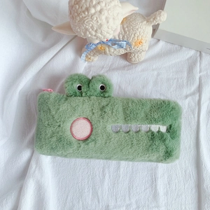 Cute green plush crocodile pencil case with cartoon eyes and a soft velvet texture