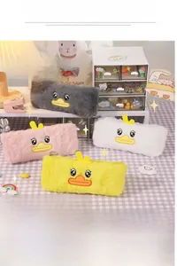 Detail view of cute plush duck pencil case showing embroidery and 25-pen capacity