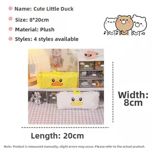 Macro view of plush duck pencil case showing size dimensions and yellow fabric texture