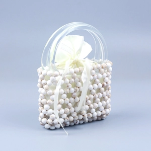 Handmade beaded handbag with marble texture acrylic handle and satin drawstring liner