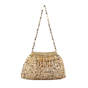 Handmade woven gold metal disc shoulder bag with a mirror finish for evening parties