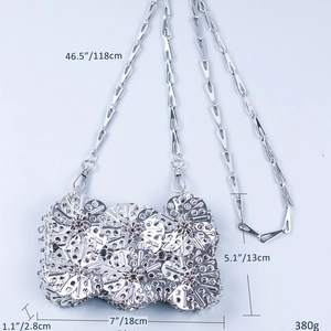 Detail showing dimensions and 380g weight of silver chain bag with metal sequins