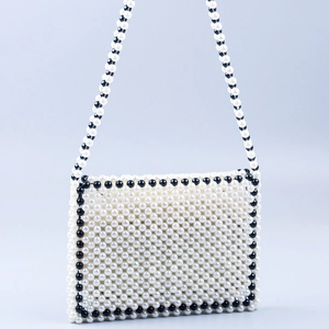 Handmade faux pearl crossbody bag with elegant black and white beaded envelope design