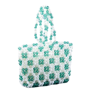 Handmade beaded handbag with emerald green and white floral acrylic pearl patterns