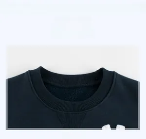 Close-up of ribbed crew neck with V-stitch and warm fleece lining on blue sweatshirt