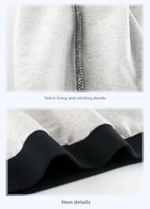Detail of gray fleece fabric lining and black ribbed hem on a child's sweatshirt