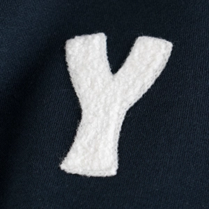 Kids navy fleece sweatshirt featuring a premium white chenille embroidered letter Y