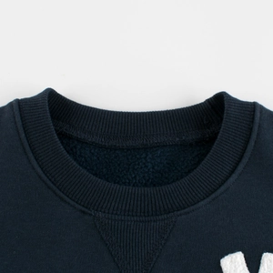 Dark blue fleece-lined sweatshirt with ribbed crew neck and white embroidery details
