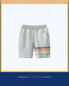 Detail of grey kids' knit shorts featuring colorful side stripes and elastic waistband