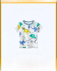 Detailed view of white cotton T-shirt featuring colorful cartoon dinosaurs and blue neckline