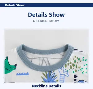 Close-up of the cotton crew neck collar with green dinosaur and blue plant cartoon print