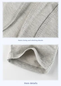 Detail view of grey knit cotton fabric featuring high-quality stitching and french terry lining