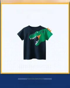 Detail of navy boy's t-shirt with green dinosaur print and orange 3D sleeve spikes