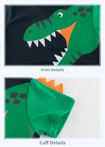 Detail showing the dinosaur print and 3D orange spikes on the navy cotton t-shirt sleeve