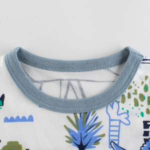 Kids cotton t-shirt with dinosaur prints and ribbed blue crew neck for summer wear