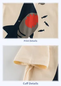 Detailansicht des Haifisch-Aufdrucks und der Doppelnaht am Ärmel eines Kinder-T-Shirts