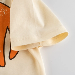 Kids beige cotton short sleeve t-shirt sleeve cuff detail with fine stitching and knit texture