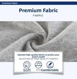 Close-up of soft heather grey knit cotton fabric showing breathable texture and weave