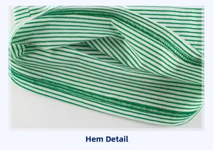 Close-up of the green and white striped hem with durable double-needle stitching