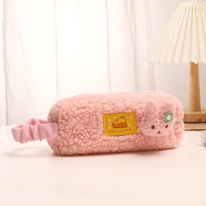 Close-up of pink teddy plush pencil case featuring cute rabbit and cheese cloud label
