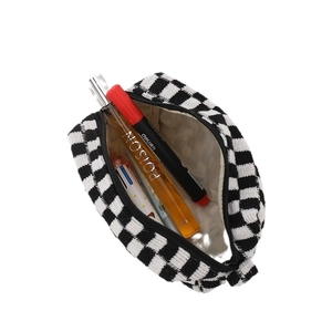 Black and white checkerboard knit makeup bag with zipper closure and large capacity