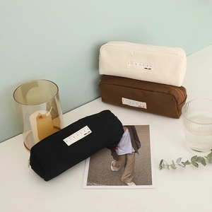 Minimalist canvas pencil case set in black, brown and off-white with ruler tag design