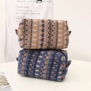 Knitted storage bag with vintage floral patterns for stationery and makeup in warm tones