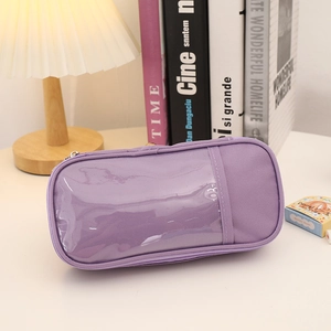 Macro shot of purple canvas pencil case with a clear PVC window and zipper closure