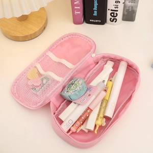 Pink canvas large capacity pencil pouch with mesh pocket full of assorted stationery