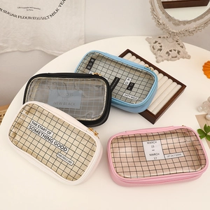Mesh pencil cases in blue, pink, black, and beige with stylish typography and metal zippers