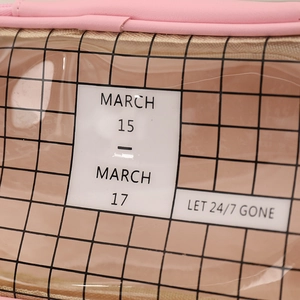 Detailed view of pink plaid pencil case showing durable fabric texture and clear PVC window