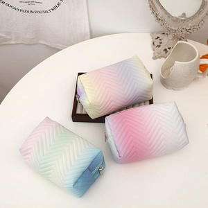 Gradient macaron color PU leather makeup bags with V-shaped quilting and metal zippers