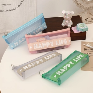 Close-up of mesh pencil cases with HAPPY LIFE straps and circular metal zippers