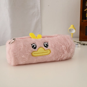 Close-up of pink plush pencil case featuring embroidered duck face and metal ring zipper
