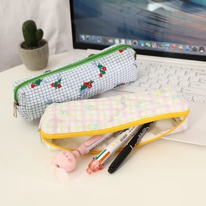 Floral bear pencil case with large capacity shown in a bright office desktop setting