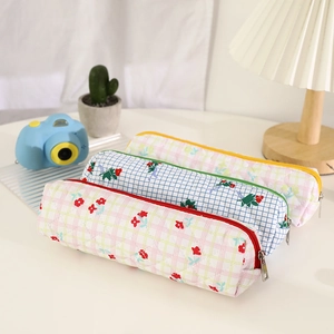 Three-piece quilted floral pencil cases with zippers for stationery and makeup