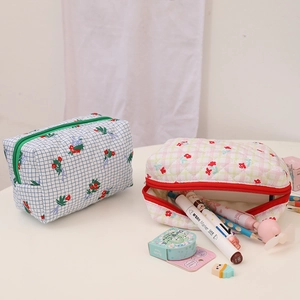 Quilted floral and checkered makeup bags in soft cotton fabric for travel storage