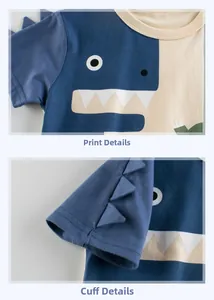 Detail of blue dinosaur print and 3D fin decoration on kid's cotton patchwork T-shirt