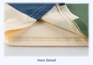 Detail of multi-color stitched hem with neat double-needle stitching on cotton knit T-shirt