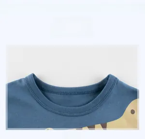 Close-up of ribbed crew neck on blue cotton t-shirt with double-stitched collar detail
