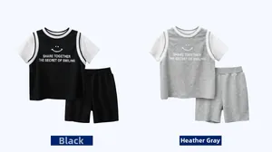 Detail of kids cotton summer sets with short sleeves and shorts in black and grey