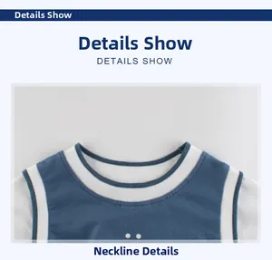 Close-up of boys blue cotton t-shirt featuring a white ribbed neckline with blue stripes