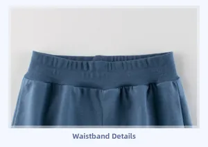 Detail of dark blue elastic waistband with multi-row stitching on children trousers