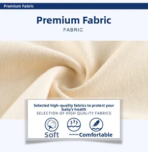 Vue détaillée du tissu en maille côtelée crème, soulignant douceur et respirabilité