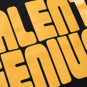Boys black long sleeve T-shirt with bright yellow Talent Genius print detail