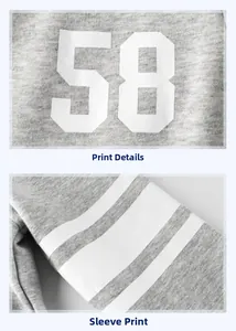 Detail of gray kids sweatshirt with white 58 print and striped sleeve cuffs