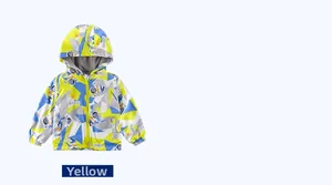 Detail of yellow toddler hoodie with space astronaut print and color block design